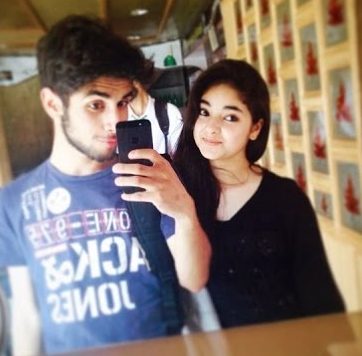 Zaira with her brother